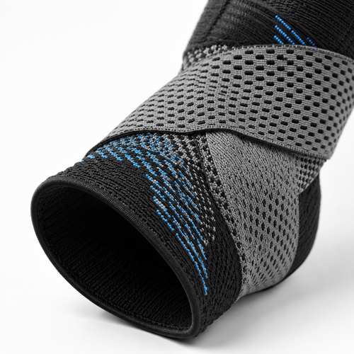 Adjustable ankle compression brace with breathable mesh support