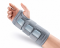 Adjustable carpal tunnel wrist brace with compression straps and removable gel pack