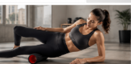 Woman using a foam roller for stretching and muscle recovery